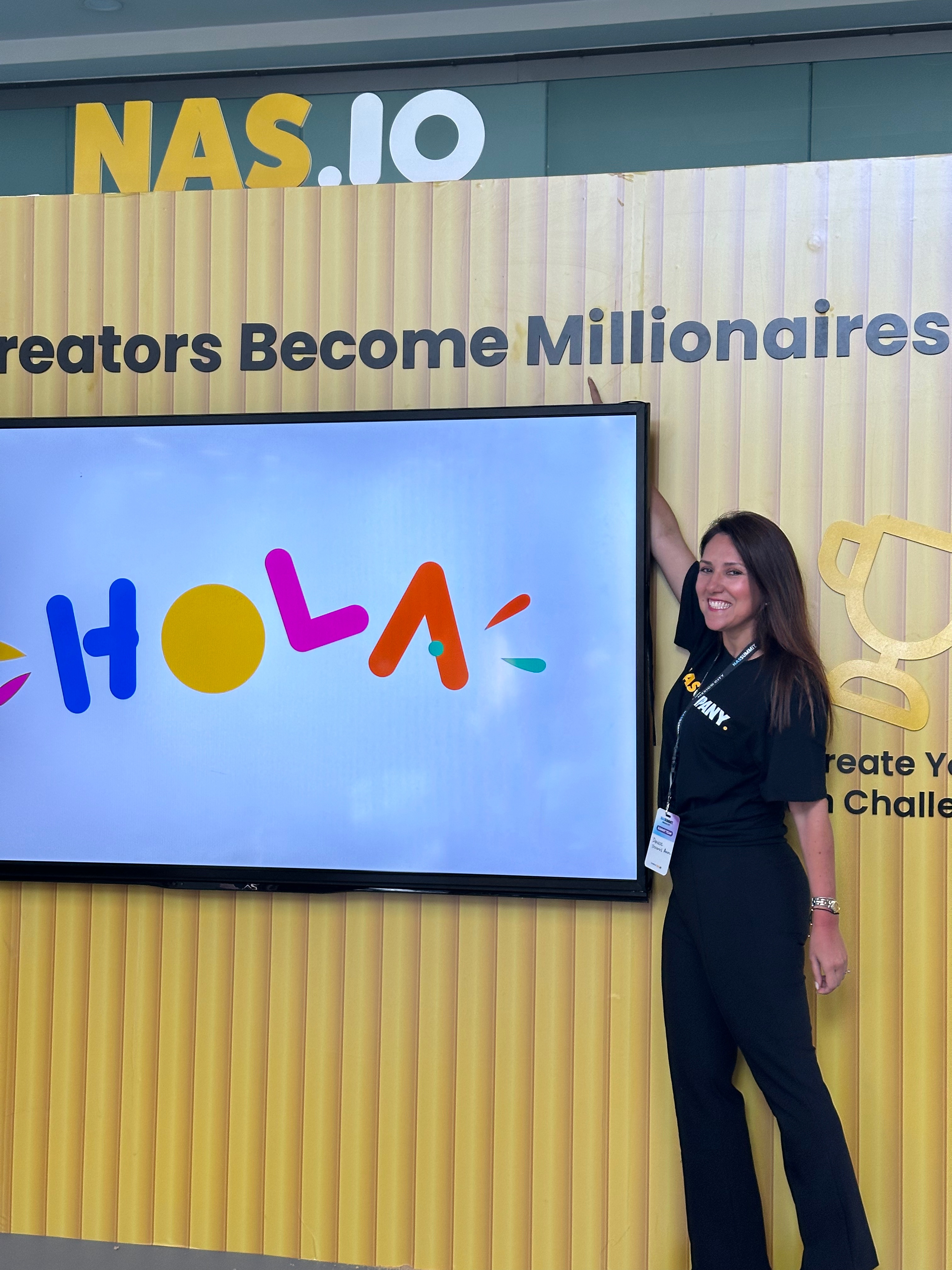 Denisse Troconis Aoun on stage at NAS.IO Creators Become Millionaires event
